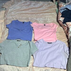 4 Crop tops! Dark purple is a M, Pink is a M, gray is a L, Light Purple is a L!